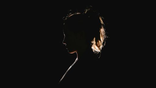 a black silhouette of a woman