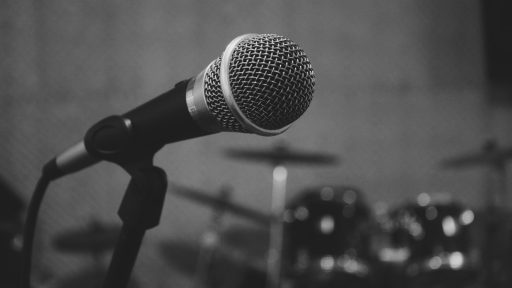 black and grey microphone on stand