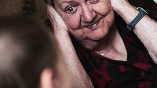 woman covering her ears photo