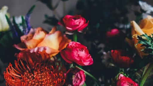 assorted petaled flowers centerpiece inside room