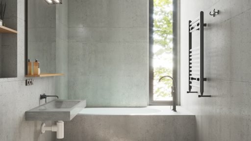 a bathroom with a toilet, sink, and bathtub