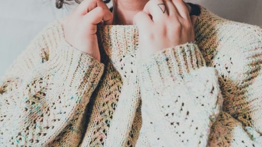 woman in white knit sweater