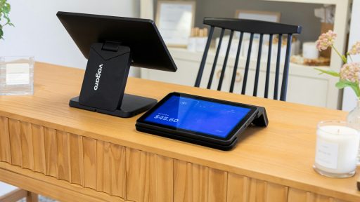 Point of sale system on a wooden counter.